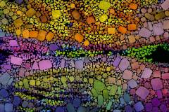 Farbiges Mosaik,  bestehend aus vielen kleinen, unregelmäßig geformten Steinchen.