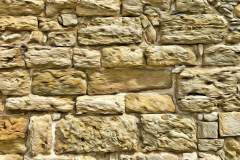 Colonnata-Mauer in beige farbenen Tönen, im Photo-to-ART Stil. Colonnata-Mauer in beige farbenen Tönen, im Photo-to-ART Stil.
