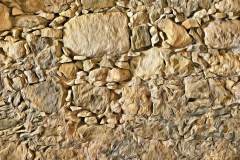 Colonnata-Mauer in beige farbenen Tönen, im Photo-to-ART Stil. Colonnata-Mauer in beige farbenen Tönen, im Photo-to-ART Stil.